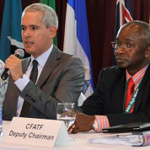 Chairman Manuel Gonzalez passes The Baton of Leadership to Chairman Cherno Jallow at CFATF Plenary Meeting XXXVI